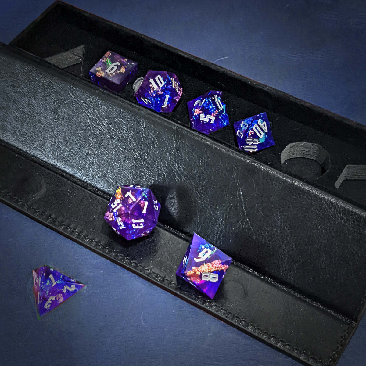 Level 14 Sorcerer Set Polyhedral Dice (7pcs) Sharp Resin Dice Purple and Blue with Gold Flecks, another view