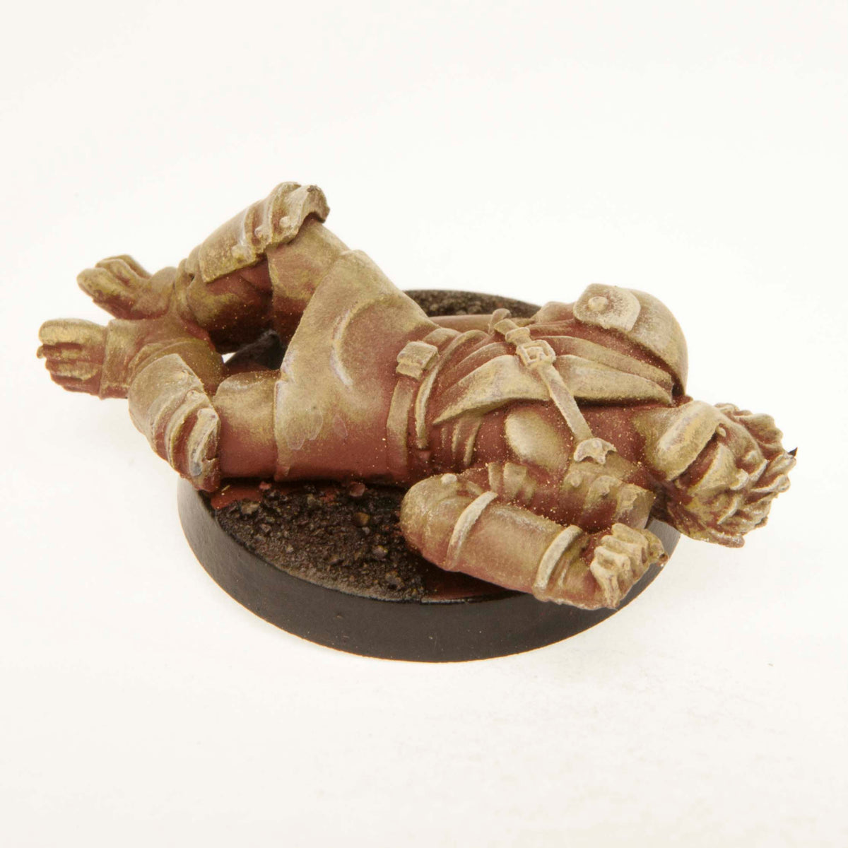 Primed pewter Half-Orc Unconscious miniature, 35mm long