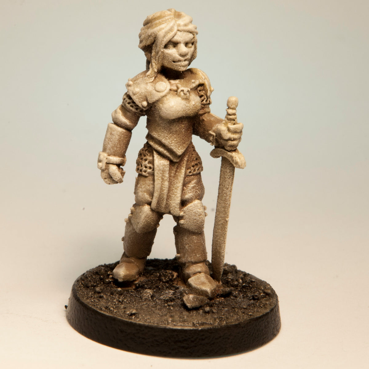 Primed pewter Human Squire Female miniature, 31mm tall