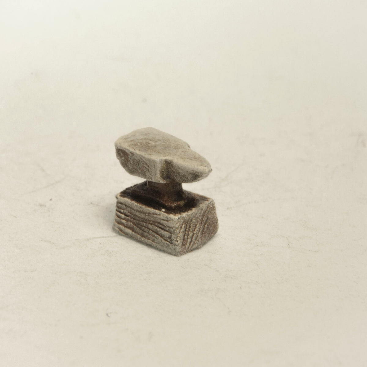 Primed pewter Anvil Accessory miniature, 7mm tall, another view