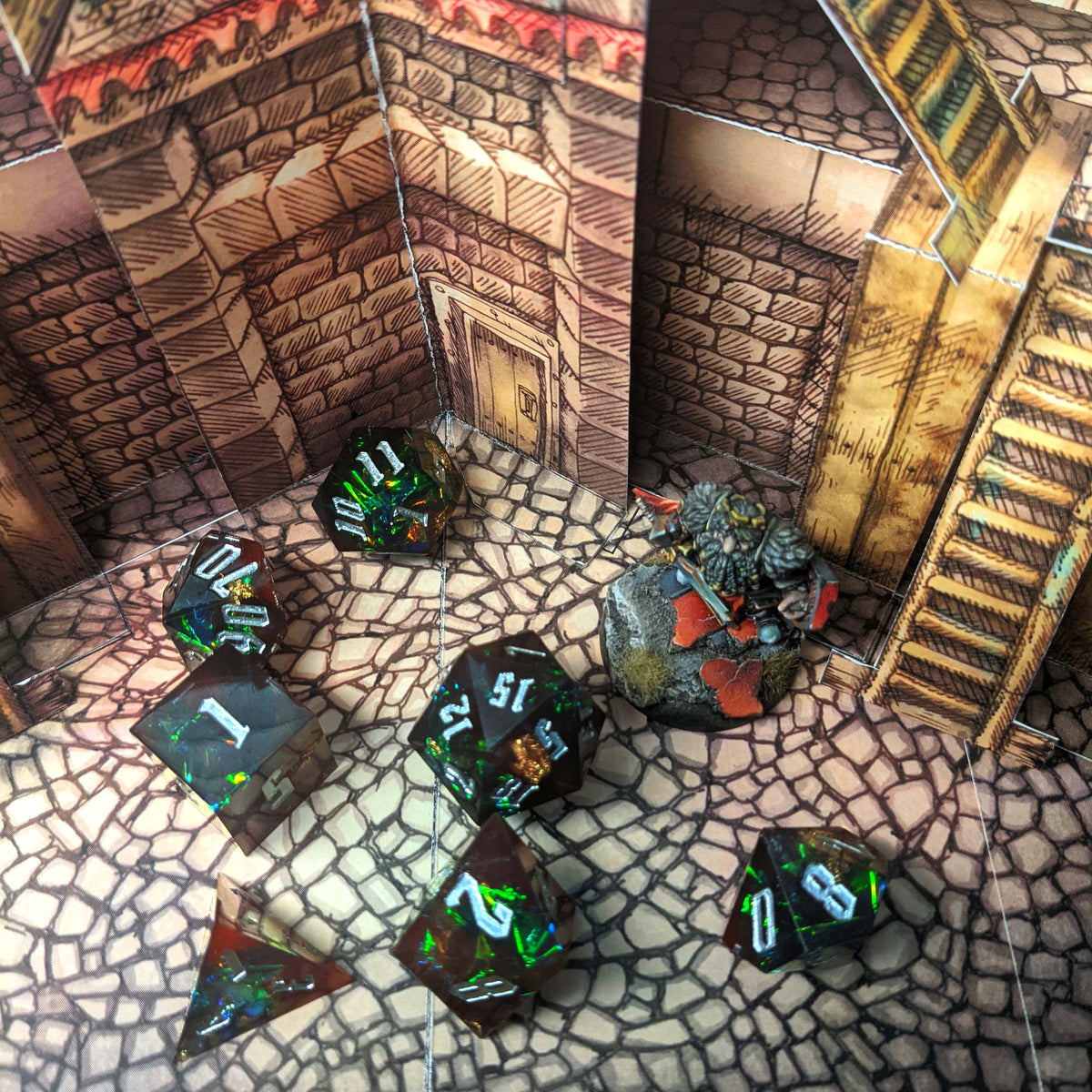 Level 14 Rogue Set Polyhedral Dice (7pcs) Sharp Resin Dice Red and Green with Gold Flecks, another view