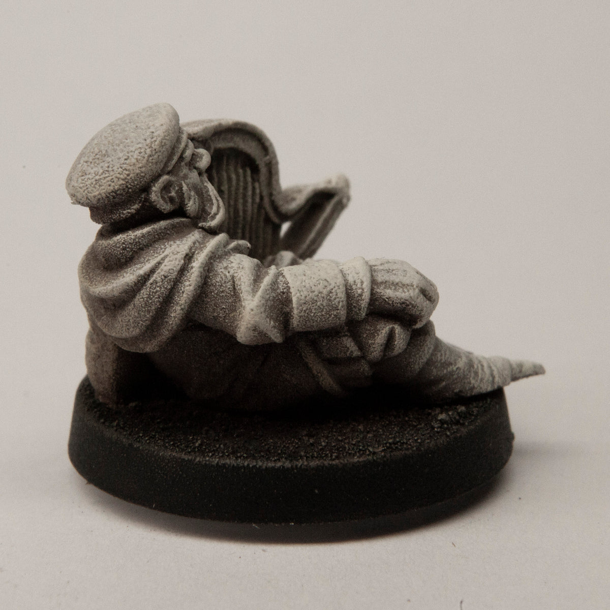 Primed pewter Male Dwarven Musician miniature, 30mm long, another view