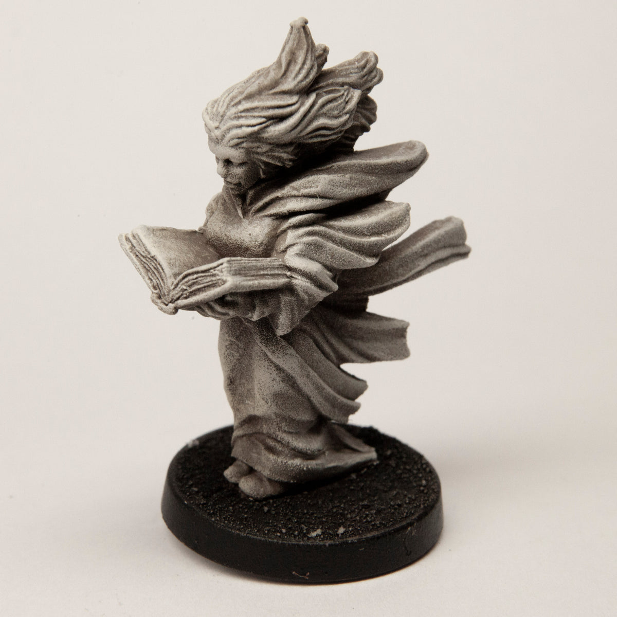 Primed pewter Female Human Elementalist miniature, 40mm tall