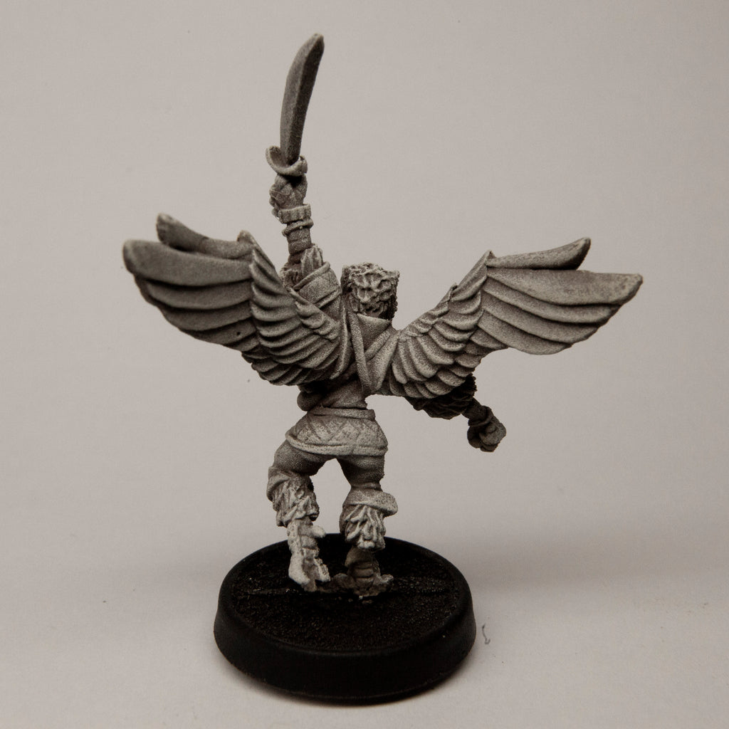 Primed pewter Female Owlfolk Fighter miniature, 51mm tall, another view