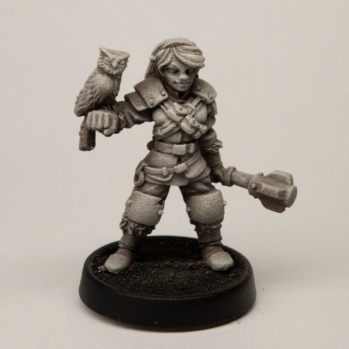 Primed pewter Female Half-Elf Cleric miniature, 32mm tall
