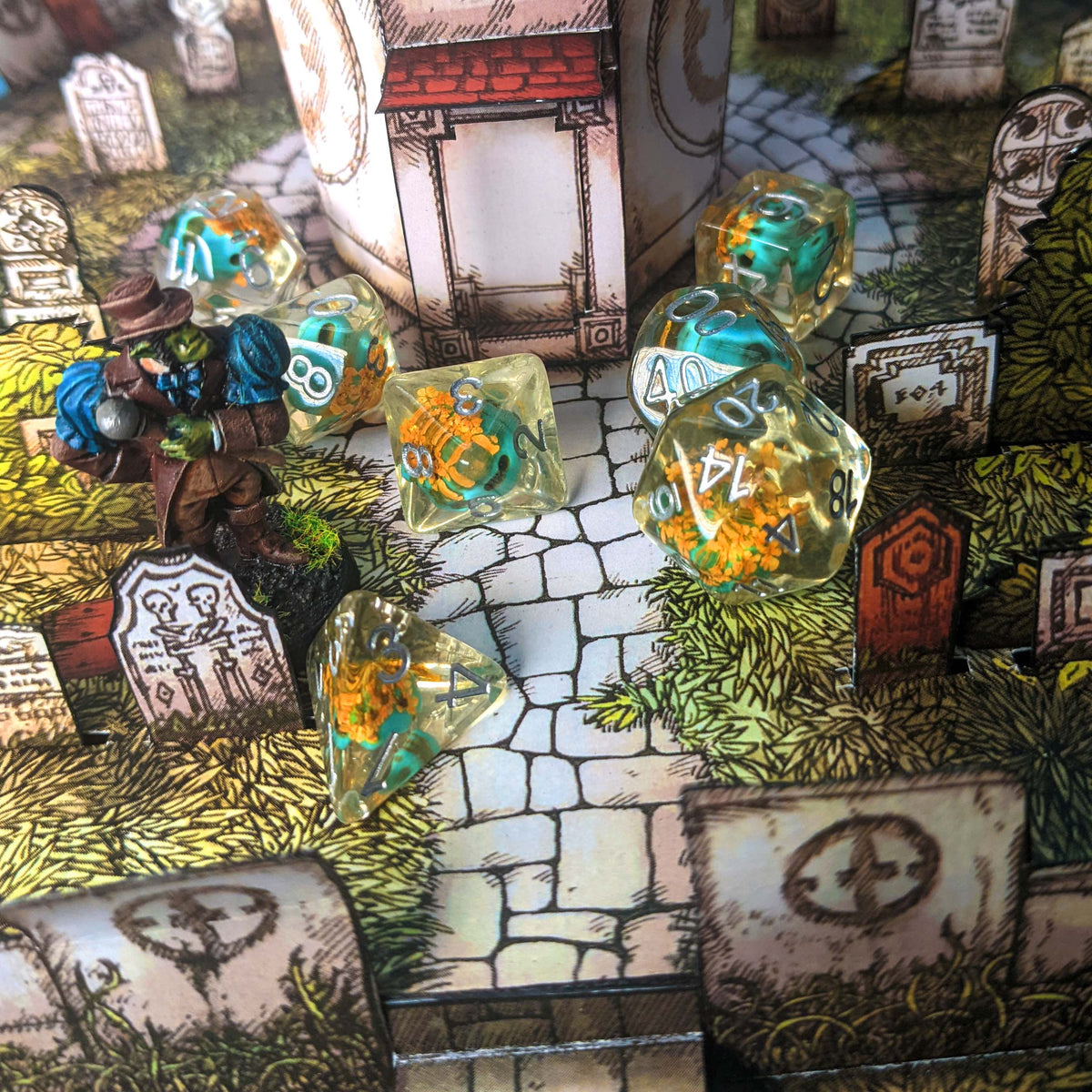 Level 10 Necromancer Dice Set Polyhedral Dice (7pcs) Clear with Blue Skull and Yellow Blossoms, another view