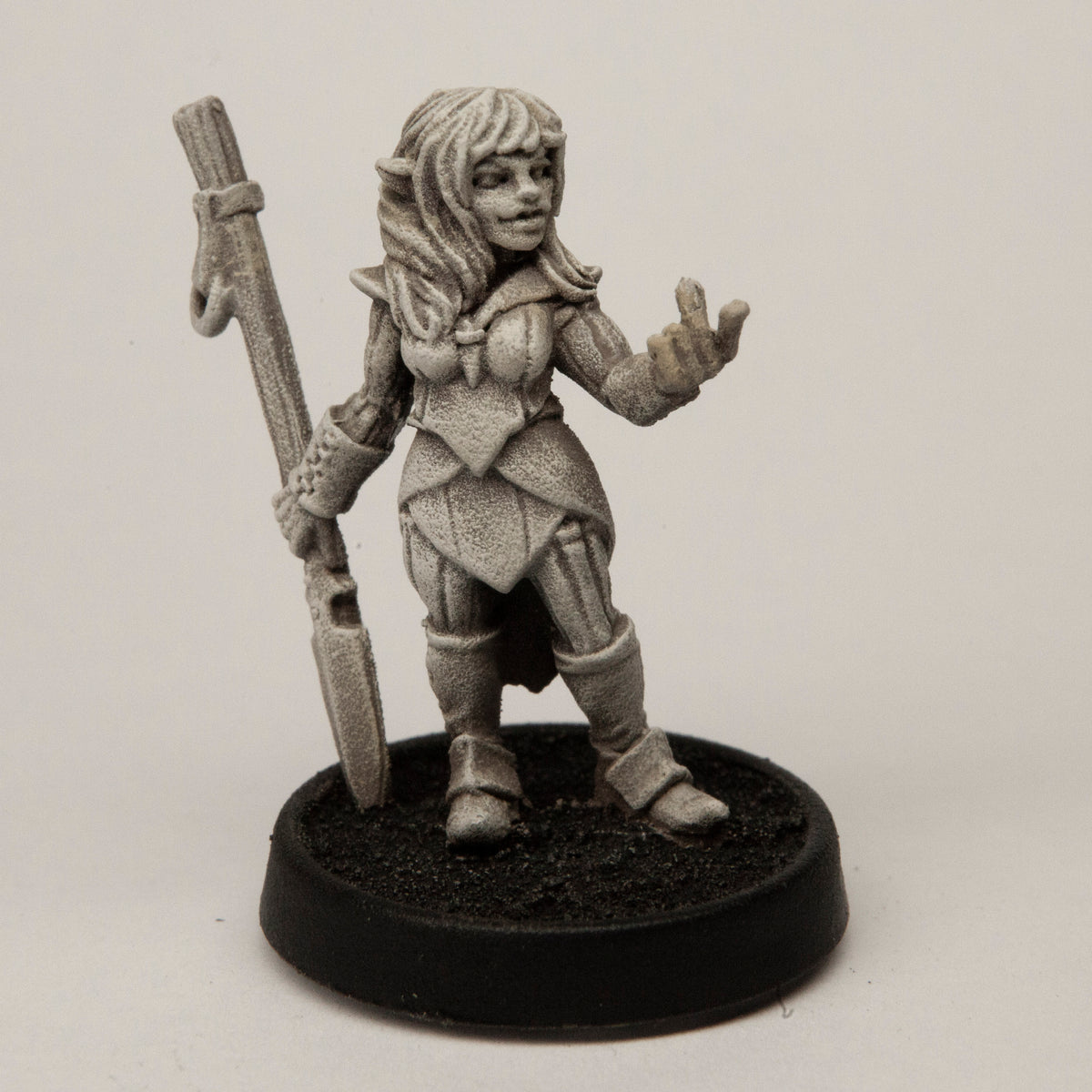 Primed pewter Female Half-Elf Monk miniature, 30mm tall