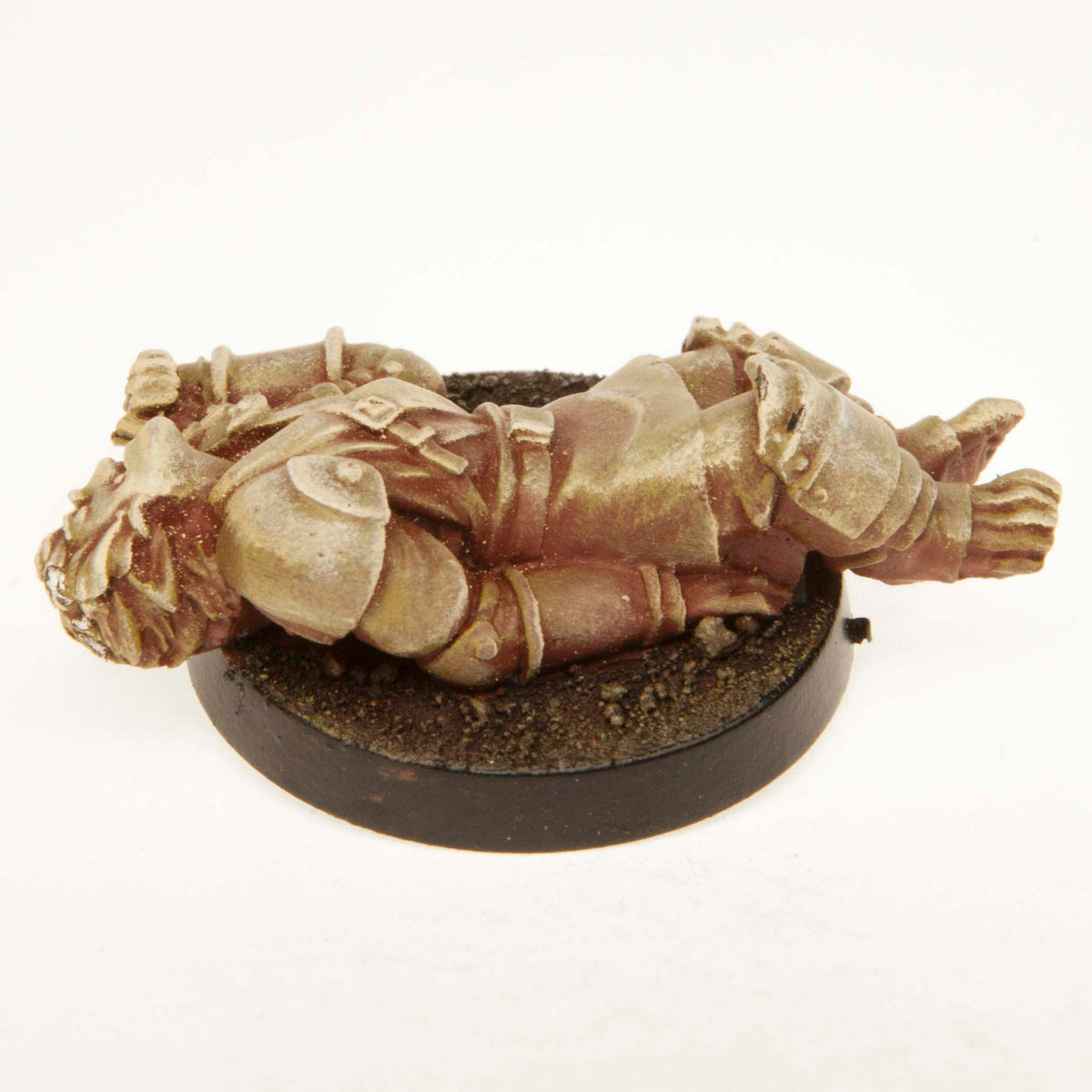 Primed pewter Half-Orc Unconscious miniature, 35mm long, another view