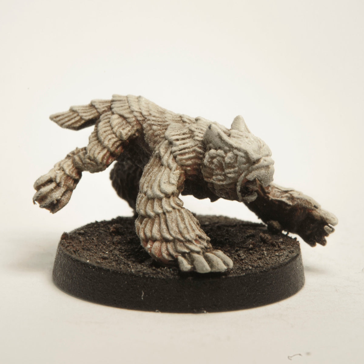 Primed pewter Owlverine miniature, 27mm long